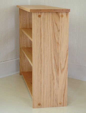 side view of bookcase with crown